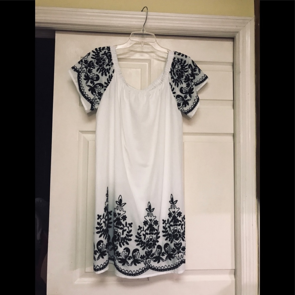 White dress with beautiful black embroidery